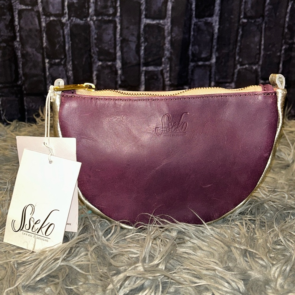 NWTS SSEKO Terra Cotta and Gold
Leather Lrg Crescent Zipper Pouch/Cosmetic Bag